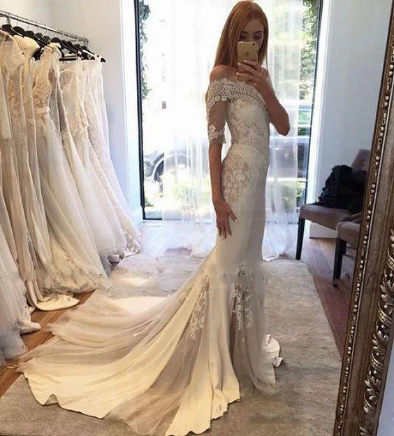 2016-Off-shoulder-Mermaid-Wedding-Dresses-with-half-Sleeves-Arabic-Cheap-bridal-Wedding-Gown-lace-vestido (1)