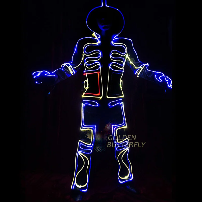 танцующие светящиеся люди. светящиеся костюмы. неоновые палочки костюм. светящиеся палочки на одежду. светящиеся костюмы в темноте.