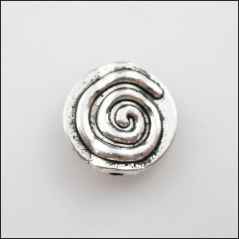 

New 10Pcs Tibetan Silver Tone Rotating Round Flat Spacer Beads Charms 12mm