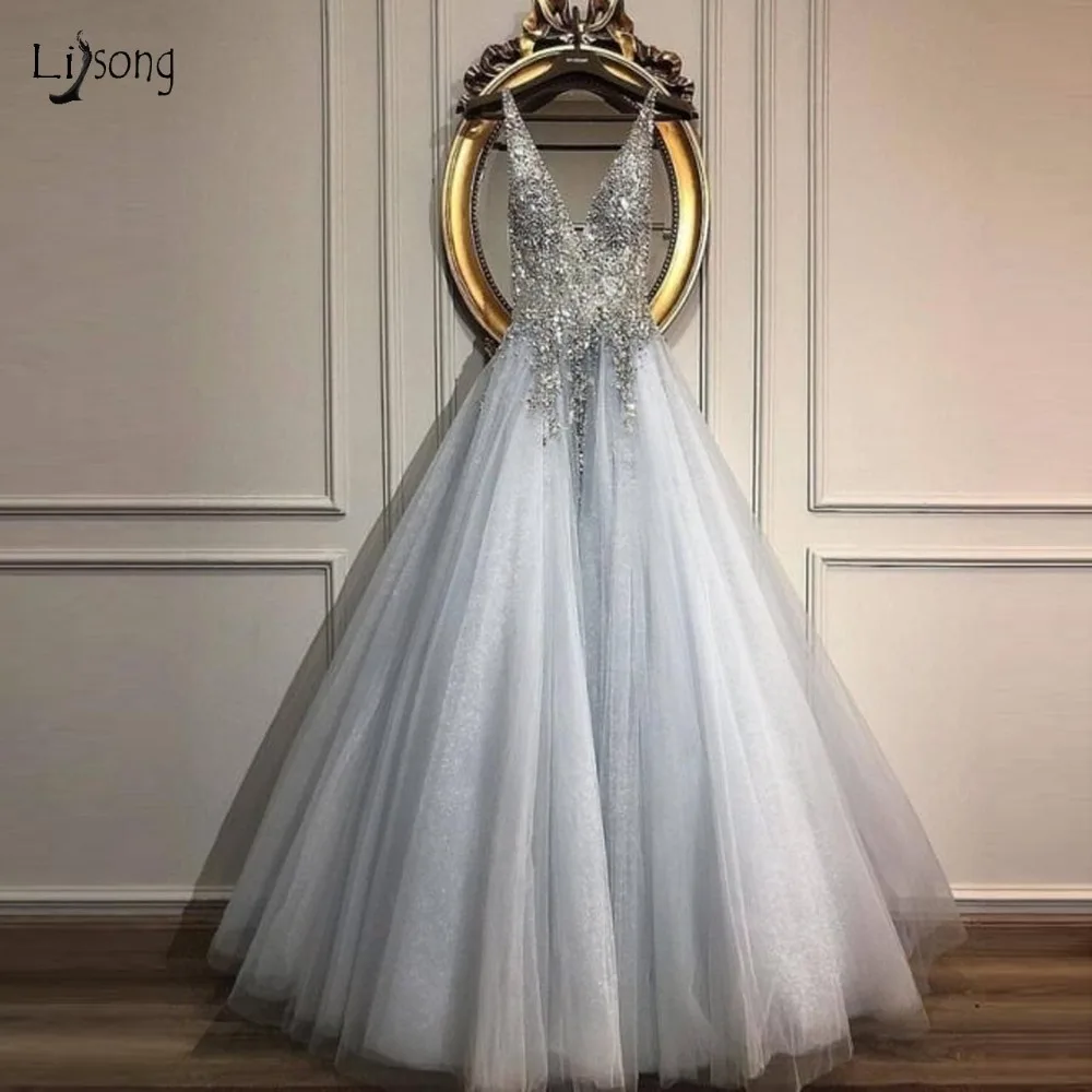 

2019 Luxury Crystal Beaded Silver Tutu Evening Dresses Puffy A-line Puffy Prom Gowns Sexy Deep V-neck Formal Dress Abendkleider