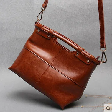 

2019 New European and American rivet original ecological leather leather leather bag single shoulder slant hand