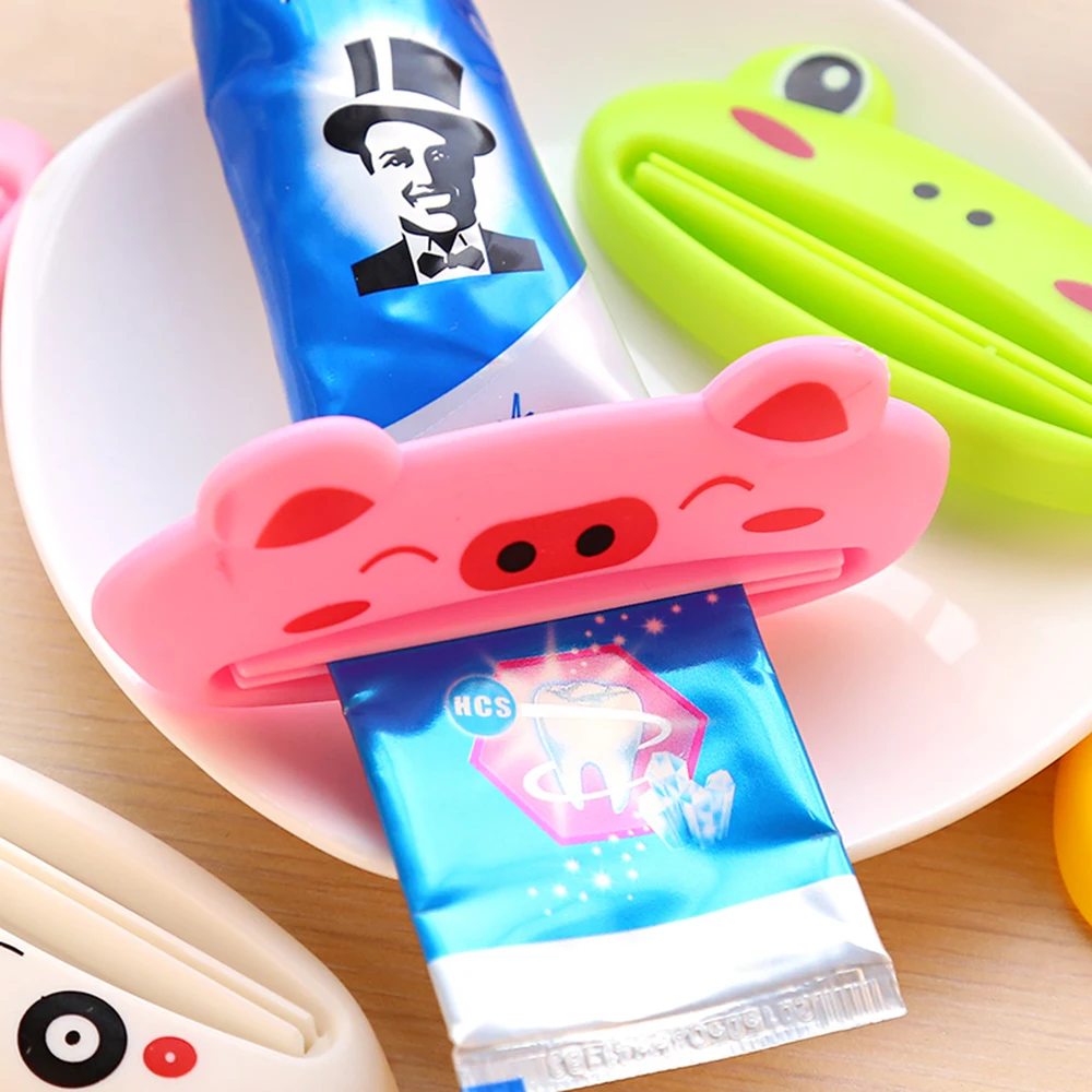 

HOT Plastic Toothpaste Squeezer Tube Rolling Holder Squeezer Cute Animal Cartoon Toothpaste Dispenser Toiletry Kits