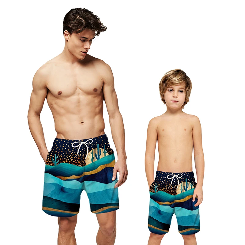 father and son matching swim shorts next