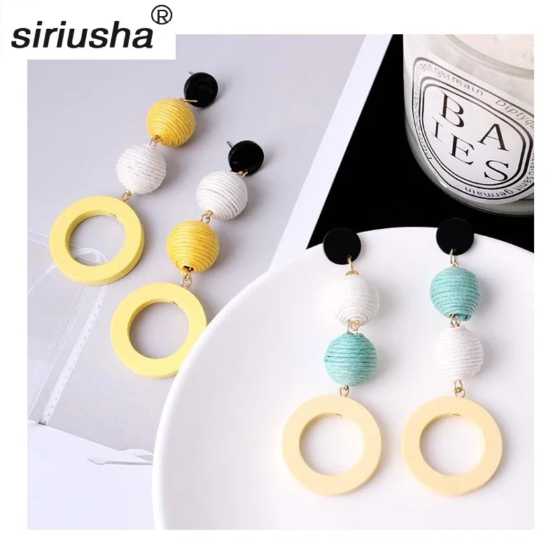 

Fashion sweet girl retro temperament linen rope hit color ball earrings wood circle shaped wooden material ear jewelry Y910