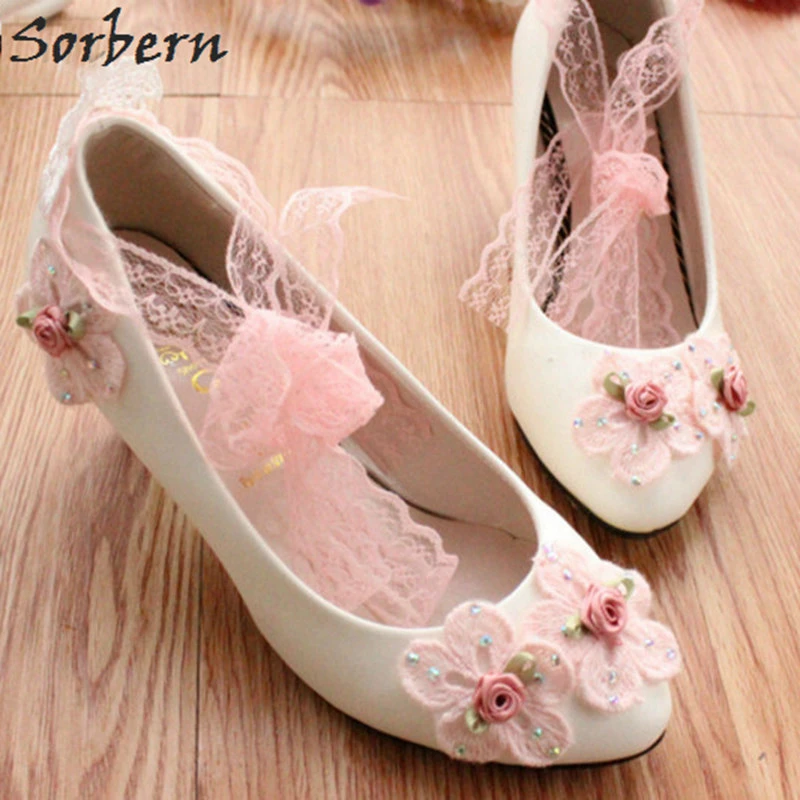 pink heels with flowers