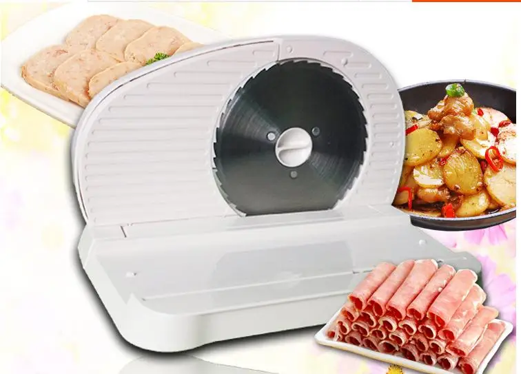 

At the electric meat slicer household electric cutting machine Kitchen appliances meat meat processing tools