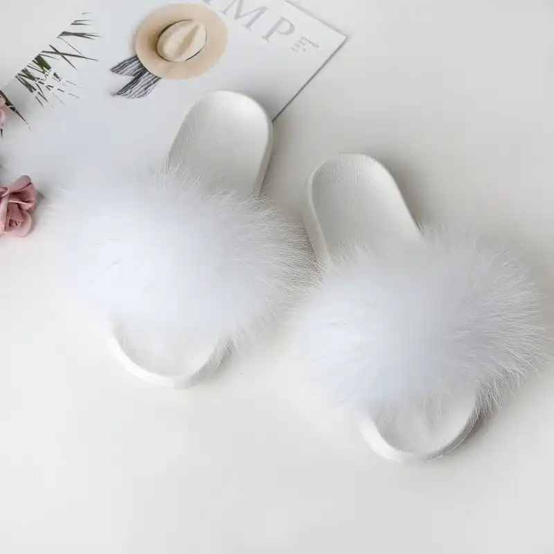 white fluffy flip flops