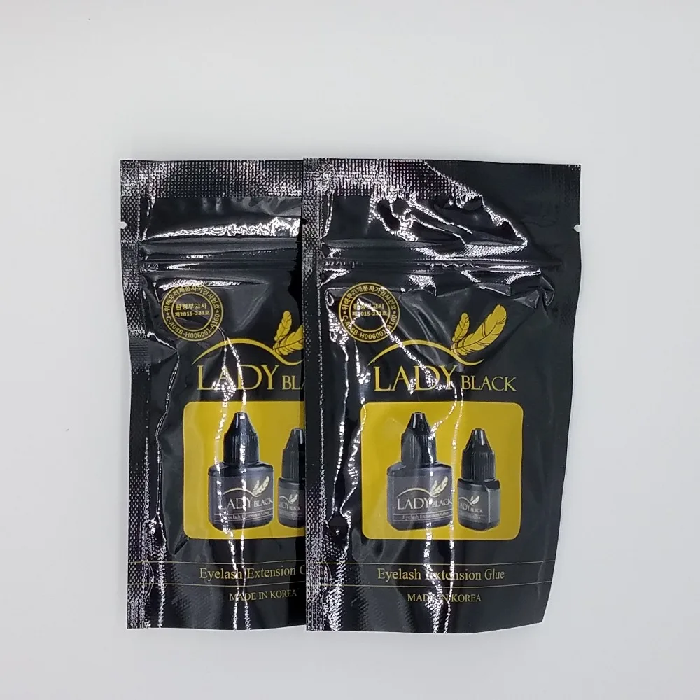 

2 bottles/lot Free Shipping Black Lady Glue Eyelash Extensions fasting dry low irritation fume adhesive With Sealed Bag 10ml