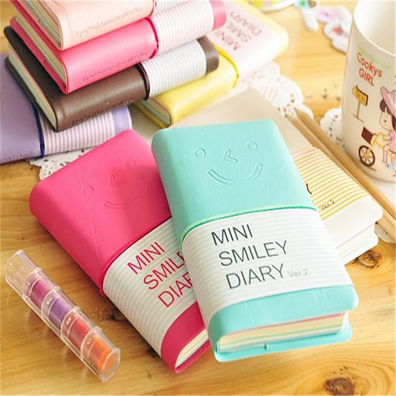 

Wholesales 1pcs 13*8.5CM Creative Random delivery Smile Diary Notebook School Leather Notebook for girls Drop Shoping