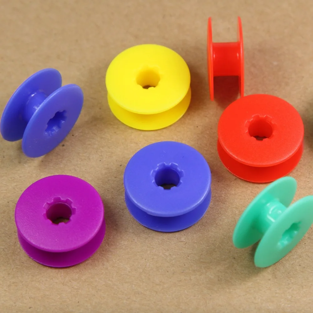 40264 PLASTIC BOBBIN FOR JUKl DDL5550, DDL8700, DDL9000/ BROTHER B735