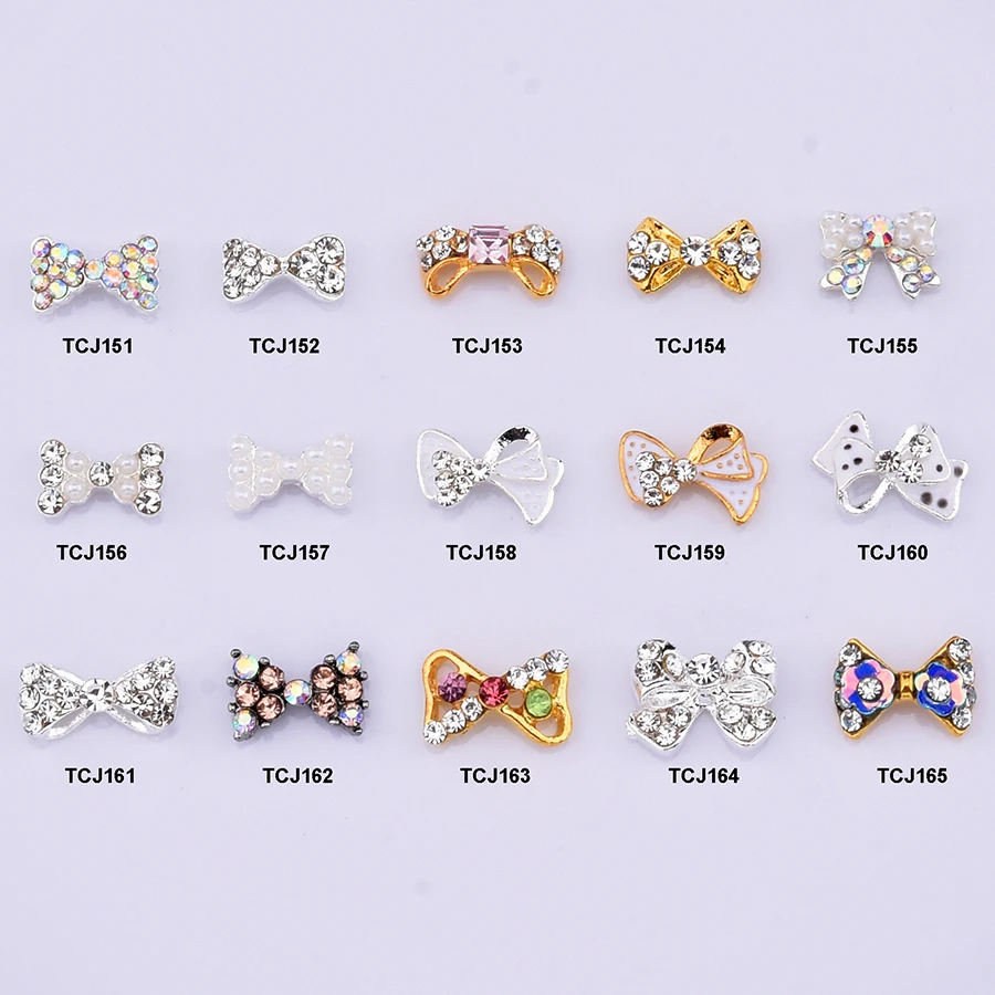 

10pcs silver alloy pearl nail bows in rhinestones 3d nail art decorations nail crystals deco ongle charms supplies TCJ151