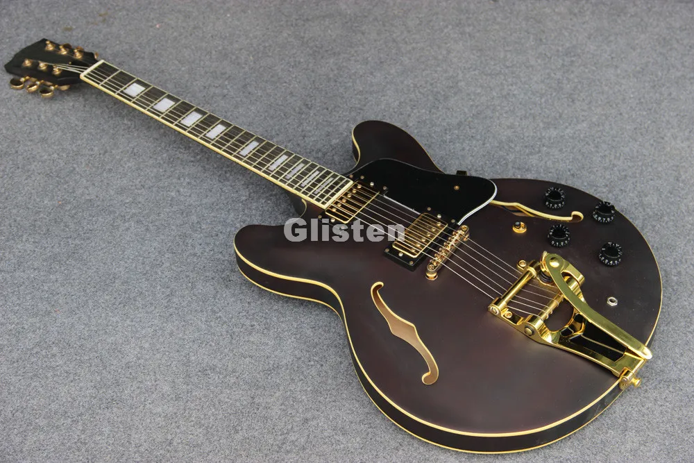 

Electric jazz guitar with bigsby tremolo arm, hollow body jazz