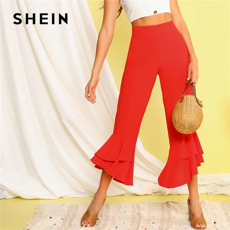 orange flare trousers