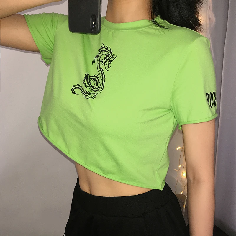 Sweetown الأزياء التنين الكرتون المحملة قميص فام النيون اللون الكورية نمط عارضة المحاصيل أعلى قصيرة الأكمام المتضخم T قميص الصيف Sweetown الأزياء التنين الكرتون المحملة قميص فام النيون اللون الكورية نمط عارضة المحاصيل أعلى قصيرة الأكمام المتضخم T قميص الصيف