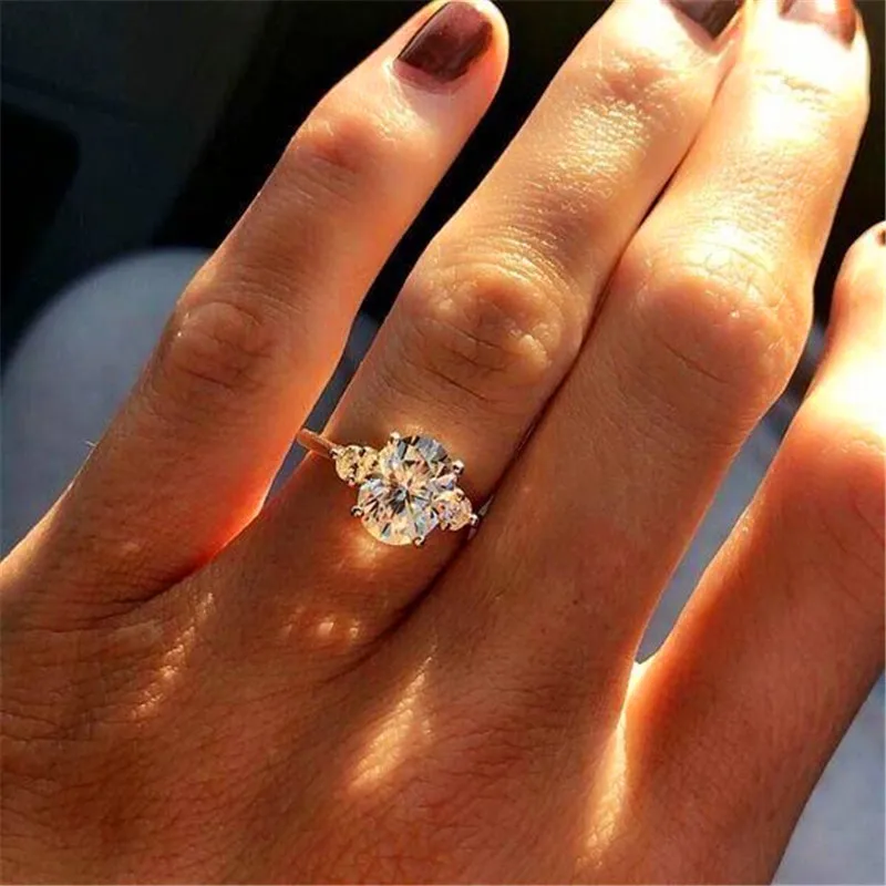 

Simple Female Big White Crystal Stone Ring Luxury Cute Silver Filled Wedding Bands Ring Promise Love Engagement Rings For Women