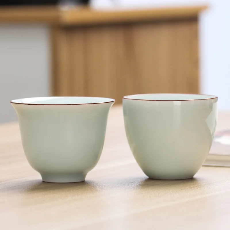 

Wholesale shadow blue glaze minimalist Chinese office kung fu teacups master cup handmade ceramic teacups custom logo