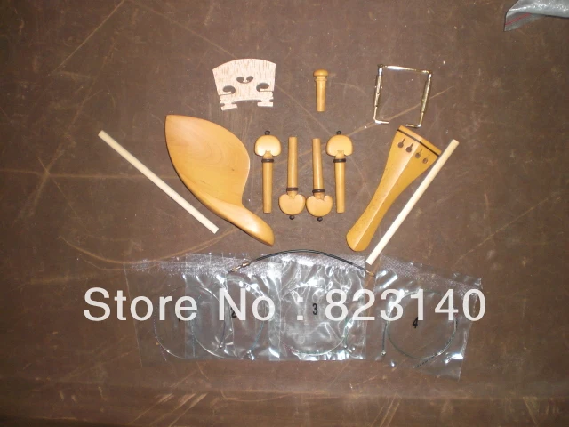 

1 Set High Grade BOXWOOD Violin fitting with Tail gut, Sound post, Gold chin rest screw, Violin bridge and Violin string