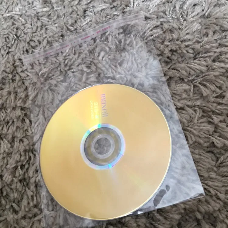 

100Pcs CD DVD Double Sided Cover Storage Case Plastic Bag Sleeve Envelope Hold