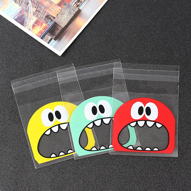 

100Pcs Cute Big Teech Mouth Monster Plastic Bag Wedding Birthday Cookie Candy Gift Packaging Bags OPP Self Adhesive Party Favors