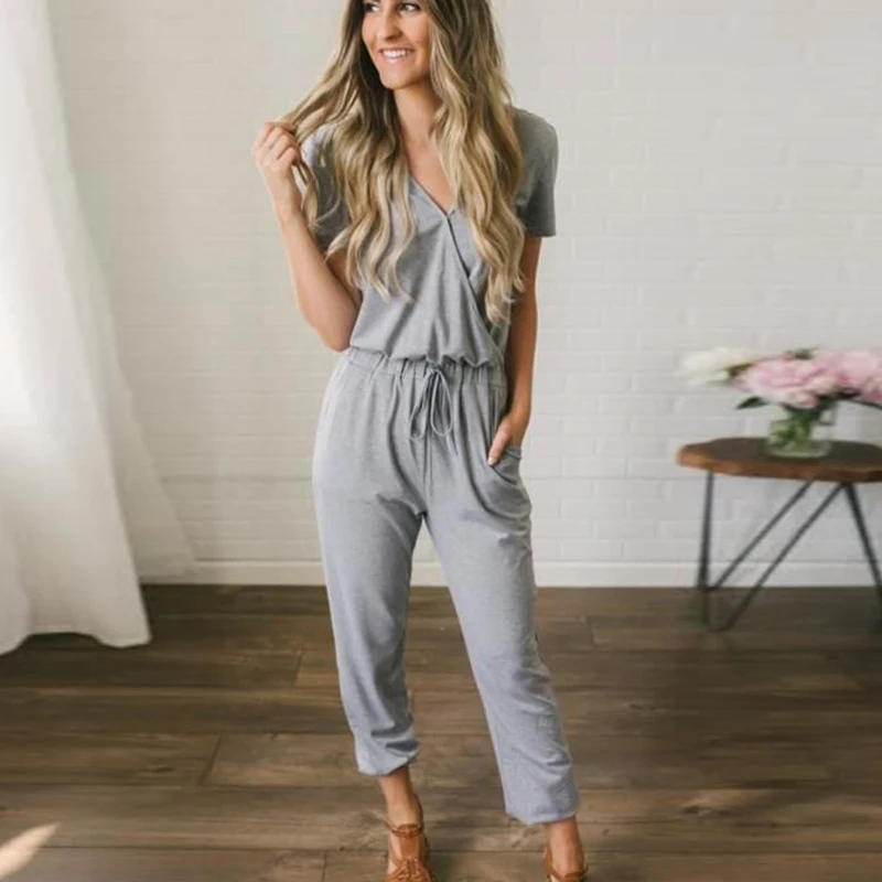 Womens rompers jumpsuit Cotton loose jumpsuit summer 2019 macac�es elegantes Solid color Vneck tie pocket jumpsuit New fashion Womens rompers jumpsuit Cotton loose jumpsuit summer 2019 macac�es elegantes Solid color Vneck tie pocket jumpsuit New fashion