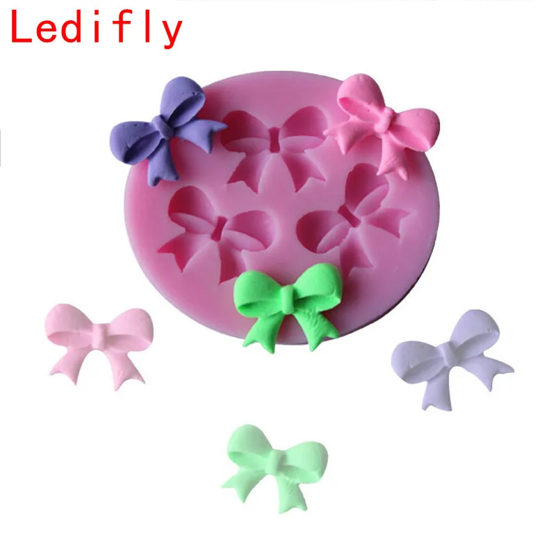 

Ledifly 2017 3-Hole Bow Bowknot Design Modeling Cake Decoration Fondant Chocolate Pudding Silicone Mold Hot Sale