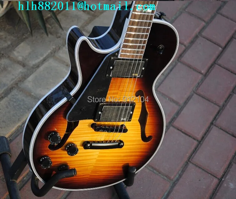 

free shipping wholesale and retail customized music instrument new left hand hollow electric guitar+foam box F-1736