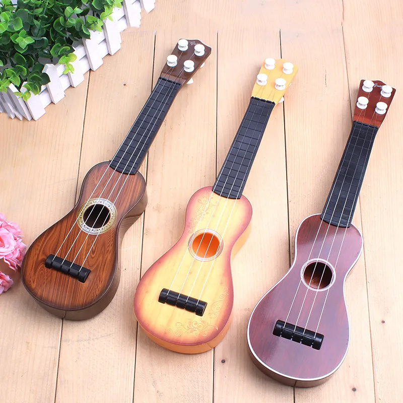 Инструмент укулеле фото Инструмент укулеле фото