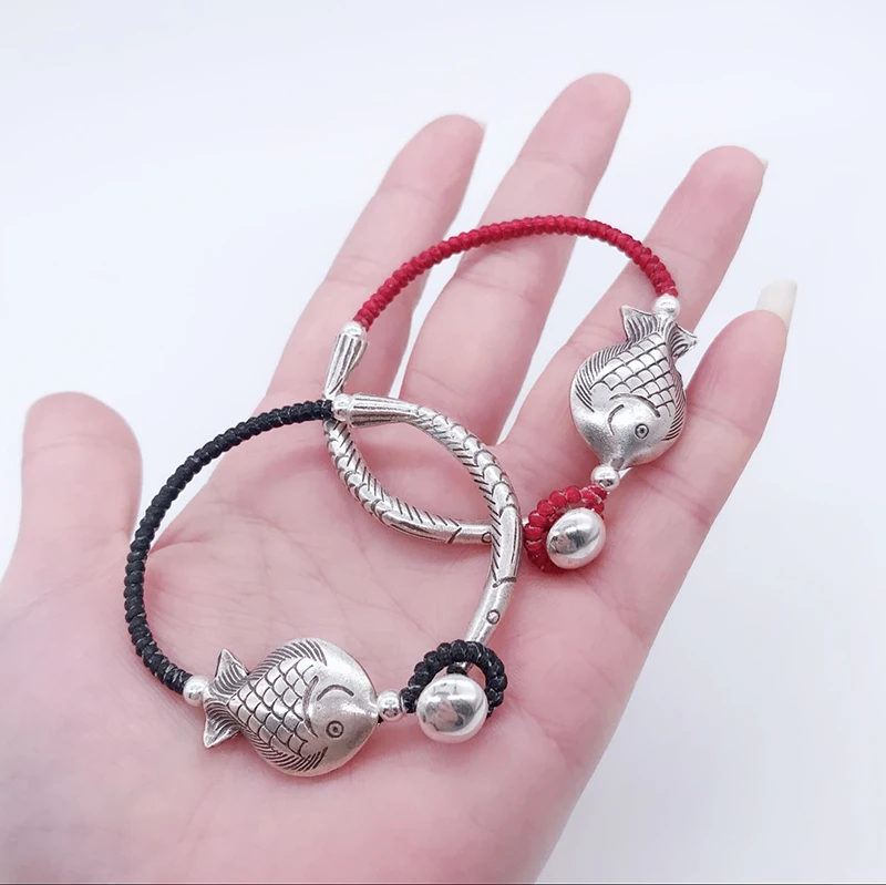 

S925 Sterling Silver Lady Bracelet with Auspicious Silver Fish Red Hand Braided rope