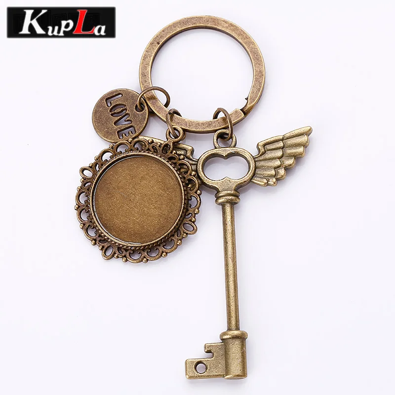 

Vintage Wings Key Keychains 20mm Round Cabochon Setting Key Chains DIY Jewelry Handmade Retro Pendant Key Chains 3pcs/lot C5817