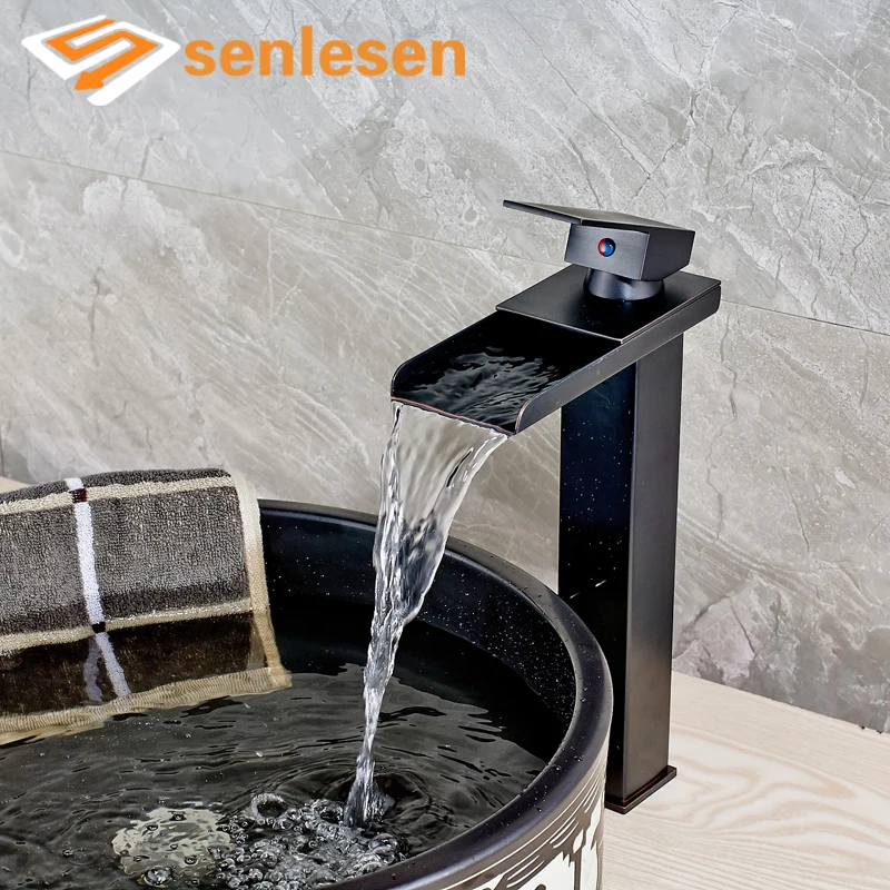 

Oil Rubbed Bronze Wash Basin Sink Mixer Faucet with Hot Cold Water Taps Deck Mounted