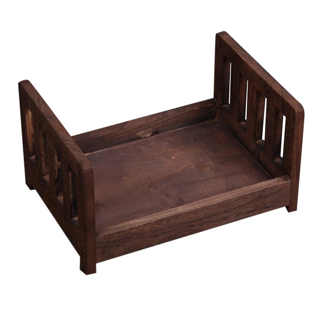small wooden cot
