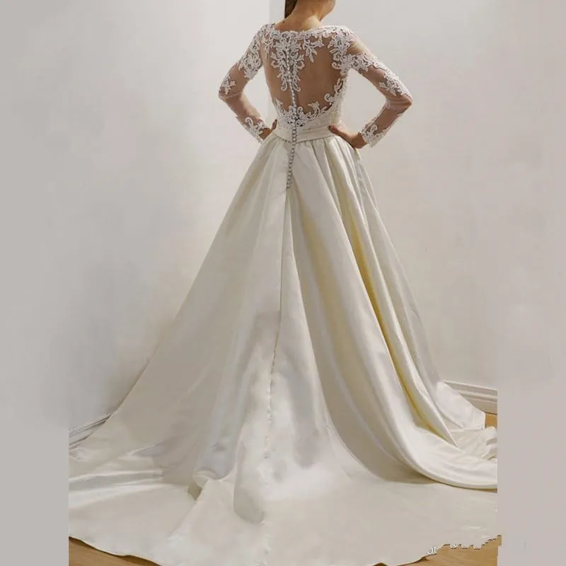 2018-arabic-wedding-dresses-beach-bohemian-long-sleeves-lace-applique-beads-sheer-back-satin-sweep-train-country-custom-formal-bridal-gowns (1)