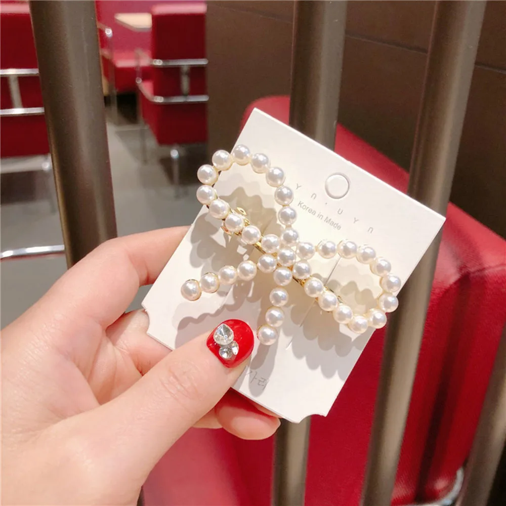 

2019 New Fashion Women Pearl Bow knot Hair Clip Snap Hair Barrette Stick Hairpin Hair Styling Accessories For Women Girls