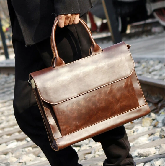 

2017 fashion man designer handbags high quality cartera hombre marca men briefcases maleta retro leather messenger bag B00003