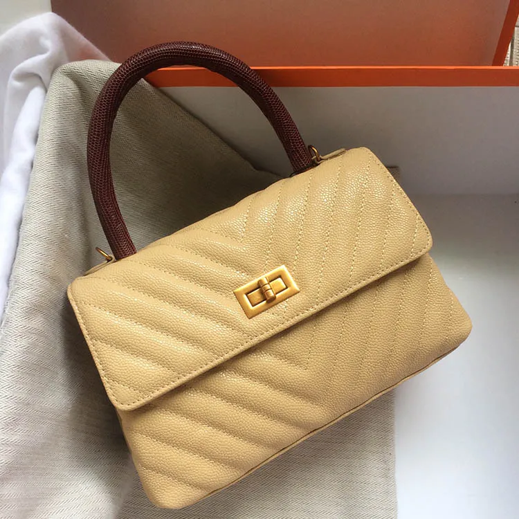 

free shipping Leather handbag Europe and the United States the new portable layer cow ball grain inclined shoulder bag handbag