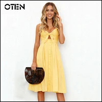 OTEN-Ladies-wear-beach-dresses-Casual-Women-Summer-Spaghetti-Strap-Button-Hollow-out-Sexy-holiday-dress