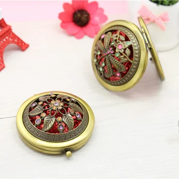 

Luxury design Portable Hollow Out Double Side Foldable Alloy Cosmetic Mirror Patterns Random