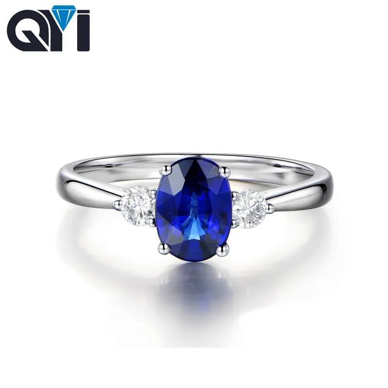 

QYI Simulated Sapphire Three Stone Rings 1.25ct Oval Cut Blue Sona Stone 925 Sterling Silver Engagement Wedding Rings For Women
