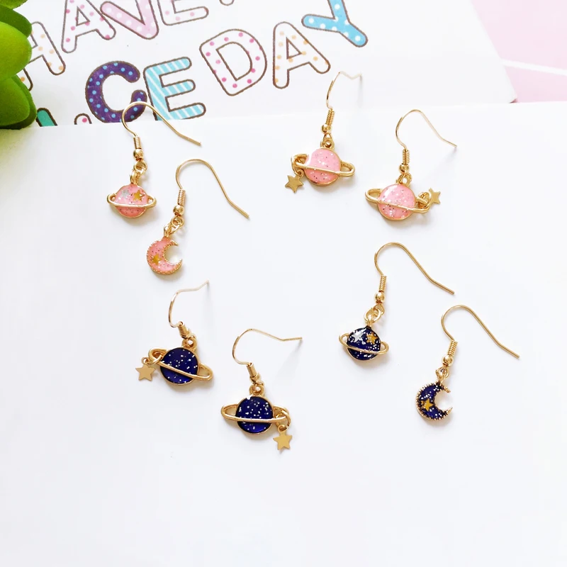 

Metal Moon Star Planet Asymmetric Earrings Wholesale