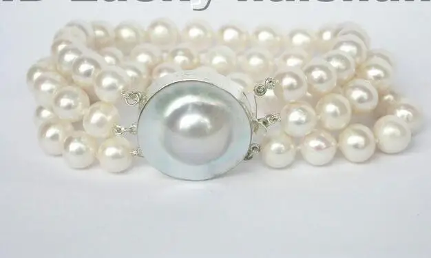 

Free Shipping >>>>> lustrous 3row 10mm round white pearl Bracelet blister 9