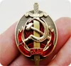 NKVD multilayer copper enamel shield and sword badge of the early KGB interior ministry ► Photo 2/6