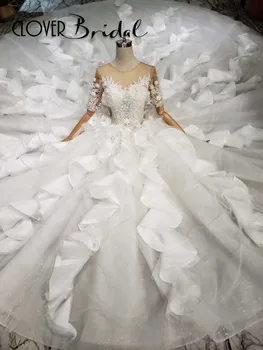 شراءCloverBridal مثير الفاخرة الكشكشة يدوية الورود اللؤلؤ الدانتيل يزين الأحجار قصيرة الأكمام تسلق الدانتيل الزفاف اللباس 2019