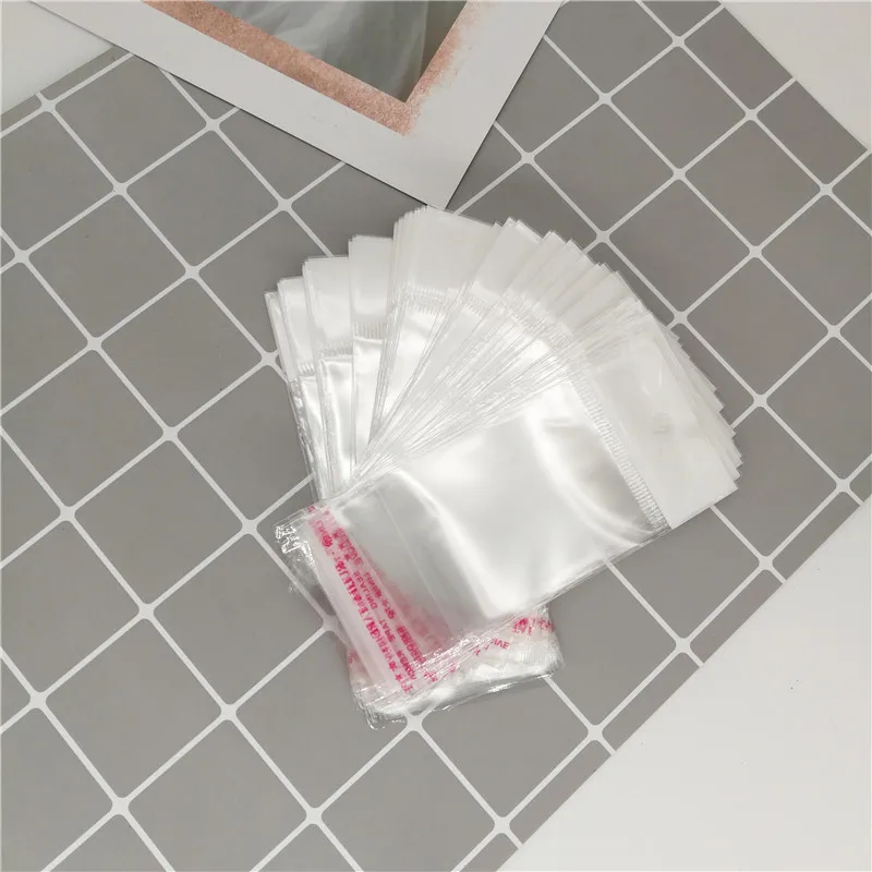 

50pcs Clear Plastic Bags for Jewelry Packaging Self-Stick Transparent Bag Pouches for Bracelets Earring Necklace Gift 3Sizes