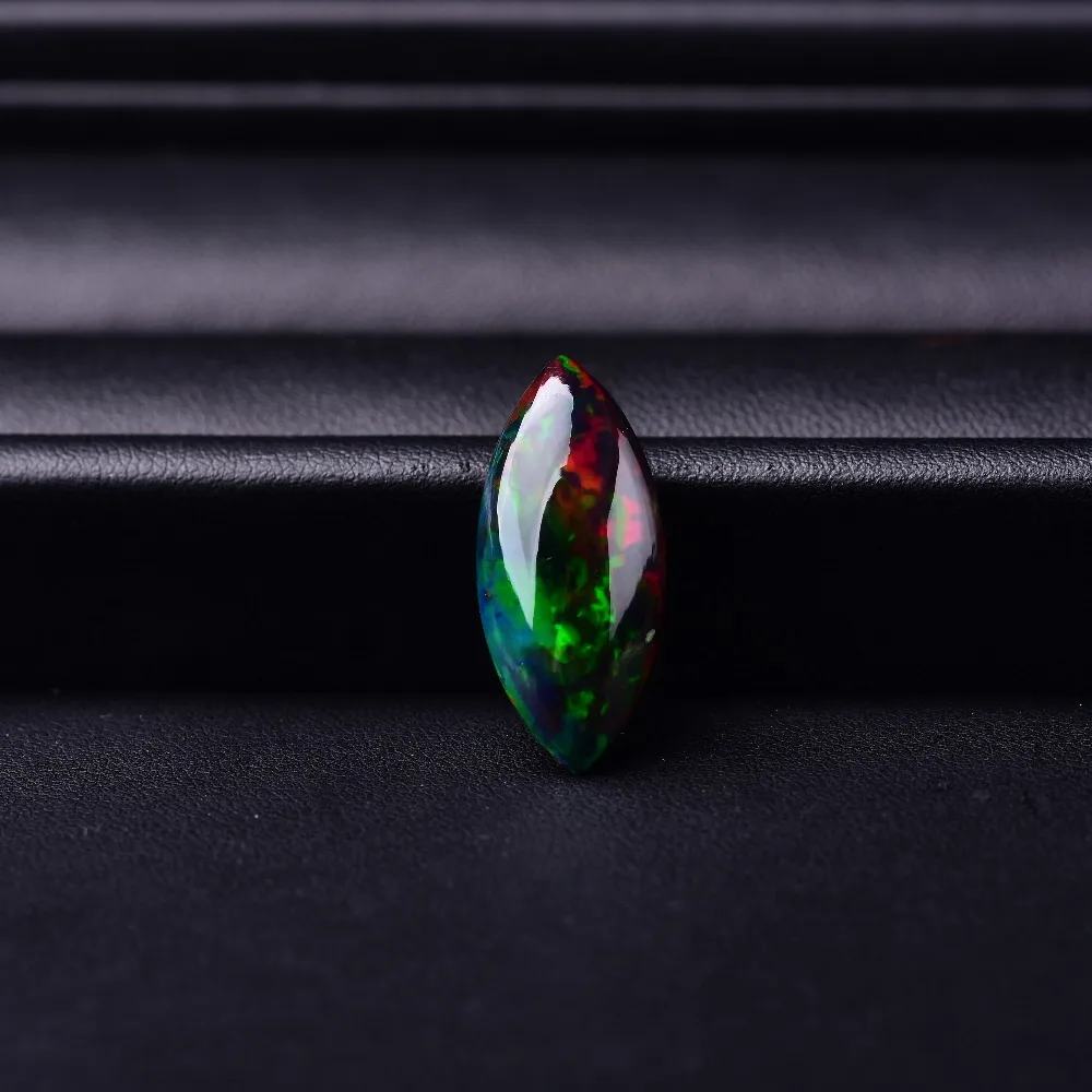

11.27ct Opel black perfect quality shiny gem 26.5*11.7*7.8mm