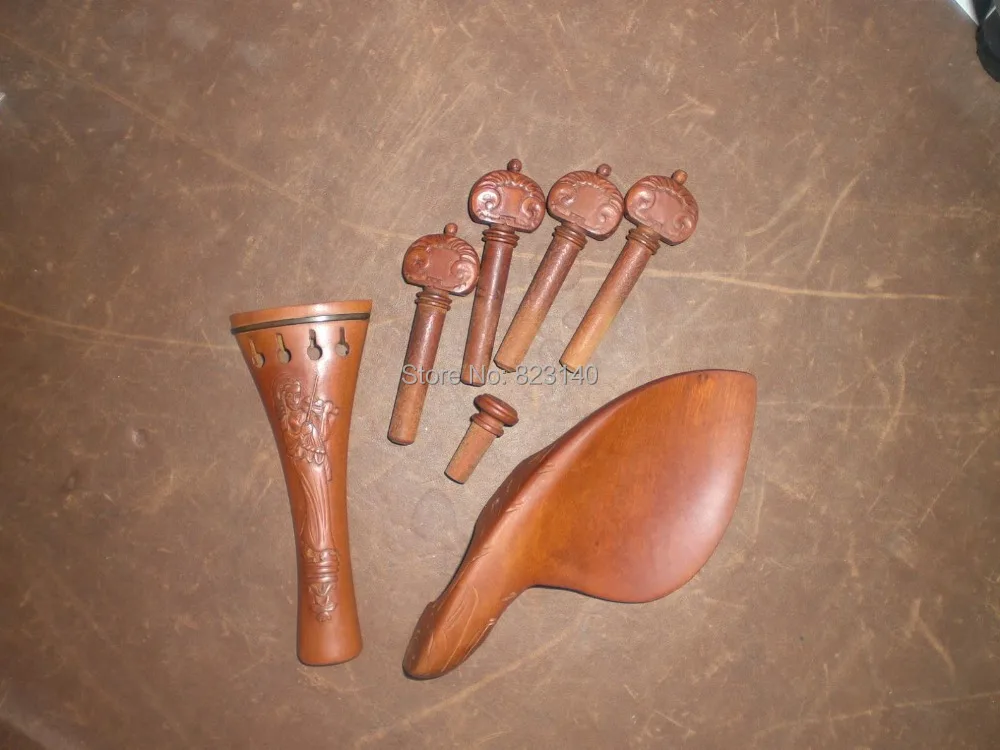 

1 Set Quality Carved Violin Jujube Fitting 4/4 including the pegs, end pin, tail piece & chin rest