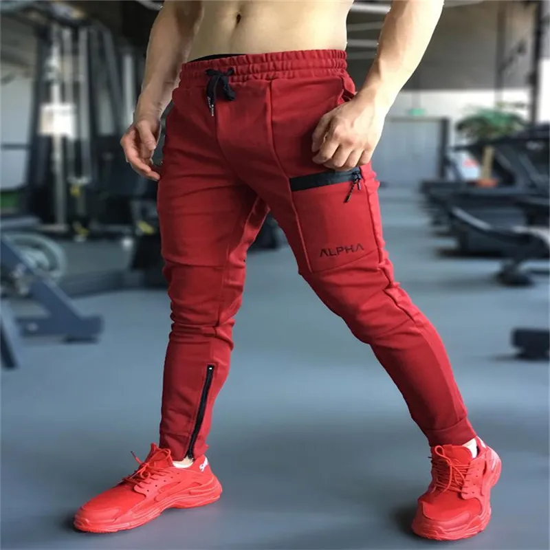 رجل ركض عارضة السراويل اللياقة البدنية الرجال الرياضية رياضية القيعان نحيل Sweatpants بنطلون أسود صالات رياضية عداء ببطء المسار السراويل
