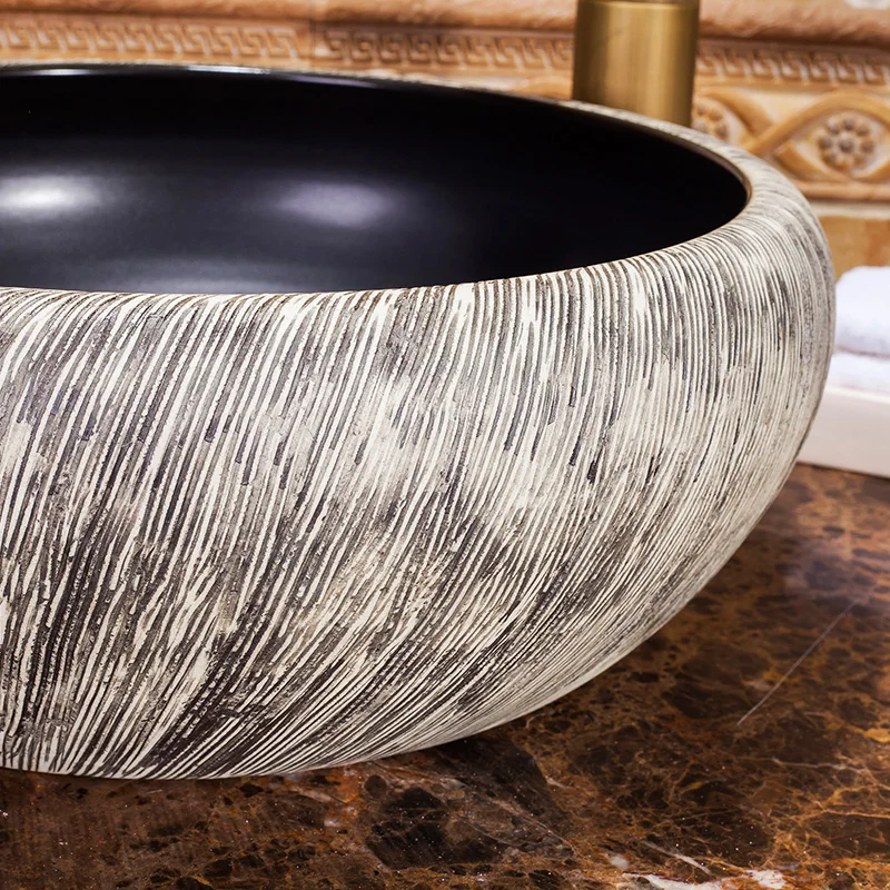 China Artistic Handmade Ceramic Bathroom Sinks Lavobo Round wash basin bathroom sink countertop (1)