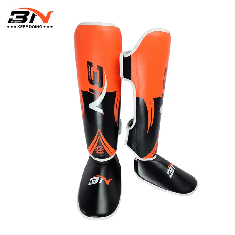 Prix pour 2017 Nouveau Une Paire De Boxe Protège-tibias Haute Qualité PU En Cuir cheville Protecteur MMA Muay Thai Formation Jambières Forte Shin Pads Prix pour 2017 Nouveau Une Paire De Boxe Protège-tibias Haute Qualité PU En Cuir cheville Protecteur MMA Muay Thai Formation Jambières Forte Shin Pads