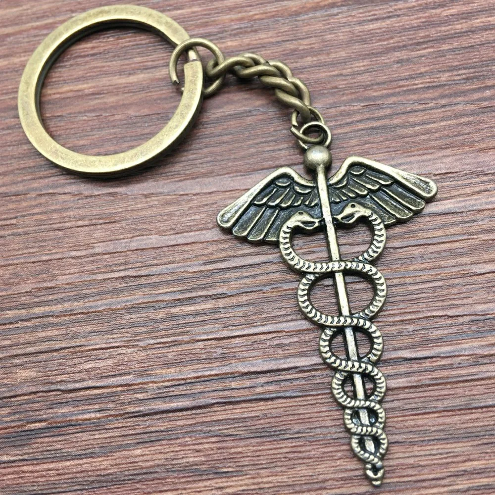 

Keyring Caduceus Medical Symbol Keychain 49x30mm Antique Bronze Fashion Handmade Metal KeyChain Souvenir Gifts For Women A10782