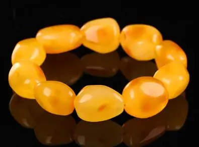 

Amber chicken oil yellow wax hand string men and women's natural pure quality stone bracelet.